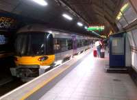 A Heathrow Express ready to depart for Paddington from Heathrow Terminal 3 on 1 June 2013.<br><br>[Ken Strachan 01/06/2013]