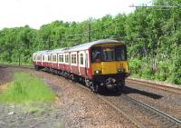 An Airdrie bound service approaching Hyndland during the afternoon of 6th June 2013.<br><br>[John Steven 06/06/2013]