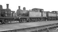 Holden F4 2-4-2T no 67155 on one of  the scrap lines at Stratford in the late 1950s. The locomotive is recorded as having been officially withdrawn by BR in 1951.<br><br>[K A Gray //]