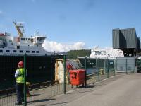 MV <I>Isle of Mull</I> comes into the Mull berth at Oban on 17 June, just as MV <I>Clansman</I> turns away from its mooring on the  15.40 sailing to Castlebay.<br><br>[David Pesterfield 17/06/2013]