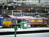 66104 stands at the buffer stops at Glasgow Central on 16 June.<br><br>[Veronica Clibbery 16/06/2013]