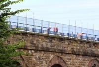 New safety fencing being erected along the deck of Newbattle Viaduct on 18 July 2013.<br><br>[John Furnevel 18/07/2013]