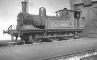 One of the Newcastle Central station pilots, J72 0-6-0T no 68736, painted in LNER green. Photographed in the Pacific shed at Gateshead in the early 1960s. [See image 40715]<br><br>[K A Gray //]
