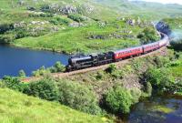 K1 No.62005 crossing the causeway at the south end of Loch Dubh near Lochailort on 19 July 2013 with the Mallaig bound <I>Jacobite</I>.<br><br>[John Gray 19/07/2013]