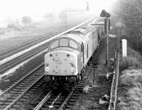 A Class 40 with a ballast train approaching Chesterfield station from the north on a misty May morning in 1980.<br><br>[John Furnevel 05/05/1980]