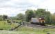 De-branded <I>Thunderbird</I> 57308, formerly known as <I>Tin Tin</I>, seen on a light engine movement from Crewe to Oxenholme passing Bay Horse on Friday 24th May 2013. The Class 57 is now owned by DRS but has not yet been repainted from its Virgin livery. <br><br>[Mark Bartlett 24/05/2013]