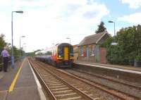 An East Midlands 158 passing through Lakenheath, Suffolk, in May 2011.<br><br>[Ian Dinmore 21/05/2011]