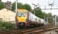 A Sunday morning service from Glasgow Central in April 2007 takes the left fork for Wemyss Bay, at the junction bearing the same name, just to the west of Port Glasgow. The train has another 10 miles or so to run to its ultimate destination. The line on the right continues west towards Gourock.<br><br>[John Furnevel 29/04/2007]