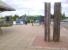 So that's where all the sleepers went - twelve wooden sleepers surround a holographic screen displaying a moving image of a nonplussed cat. A good thing to have at a Park and Ride, I'm sure you'll agree. The bus in the background took me to Cambridge along the guided busway; the former trackbed to Bedford was just out of shot to the right.<br><br>[Ken Strachan 08/06/2013]