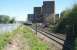 The 13.17 Newcraighall - Glenrothes with Thornton passing the site of St Margarets shed in bright sunshine on 17 May 2013. The train is just about to enter the tunnel under London Road.<br><br>[John Furnevel 17/05/2013]