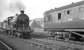 Preserved ex-NBR 4-4-0 no 256 <I>Glen Douglas</I> at Langholm with the SLS/MLS <I>Carlisle Railtour</I> on 6 April 1963. The locomotive is in the process of running round its train prior to returning to Carlisle. <br><br>[K A Gray 06/04/1963]