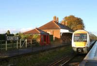 An afternoon arrival at Gunton, Norfolk, on 18 November 2003, bound for Norwich.<br><br>[Ian Dinmore 18/11/2003]