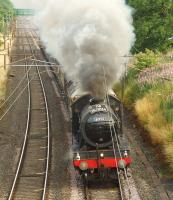 <I>The Fellsman</I> heading north on the WCML at Barton on 24 July towards its final stop at Lancaster. Once again the K4 looked and sounded like it was providing the majority of the effort, although 47580 <I>County of Essex</I> was in attendance to assist in high fire risk areas.<br><br>[John McIntyre 24/07/2013]