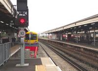 <I>Overground</I> train waiting to leave Clapham Junction for Stratford on 20 July 2013. The train will use the West London Line / North London Line route via Kensington Olympia, Willesden Junction and Highbury & Islington. [See image 43881]<br><br>[John Thorn 20/07/2013]