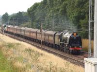 The <I>Cumbrian Mountain Express</I> railtour from Liverpool to Carlisle on 27 July 2013 on the return leg with 46233 <I>Duchess of Sutherland</I> displaying the <I>Royal Scot</I> headboard heading south on the WCML at Brock. <br><br>[John McIntyre 27/07/2013]