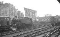 Ivatt 2MT no 41229 shunts the west sidings at Carlisle station, thought to be in 1966. The 2-6-2 tank was withdrawn from Upperby shed in November that year.<br><br>[K A Gray //1966]
