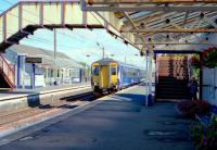 The 9.38 Glasgow Central - Stranraer runs non-stop through Prestwick Town station on 31 July 2013. <br>
<br><br>[Colin Miller 31/07/2013]