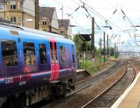 About to restart its journey at Haymarket platform 4 on 9 August is the TransPennine 12.11 Edinburgh Waverley - Manchester Airport. The train is signalled for the Carstairs route at Haymarket East Junction.  <br><br>[John Furnevel 09/08/2013]