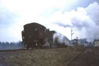 A Standard 2-6-4 tank climbs past Eastwood signal box on the East Kilbride branch in April 1966 during the last week of steam haulage. The box served the Argus Foundry on the right, built by Weirs of Cathcart in 1920 and closed circa 1959.<br><br>[John Robin 12/04/1966]