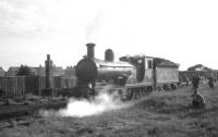 The locomotive shed at Silloth was officially closed in July 1953. <I>Gordon Highlander</I> stands on the old shed site 11 years later, following arrival at Silloth station on 13 June 1964 with the <I>Solway Ranger</I> special from Carlisle.<br><br>[K A Gray 13/06/1964]