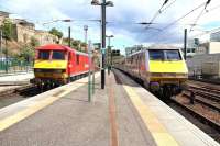 The 14.00 Edinburgh Waverley - London Kings Cross pulls out of the station into bright sunshine on 9 August, passing DBS 90029 in the east end locomotive bay prior to entering the Calton Tunnel. <br><br>[John Furnevel 09/08/2013]