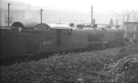 V1 2-6-2T no 67602 in the shed yard at Heaton on a misty 13 October 1962. Withdrawn from Eastfield 5 months earlier the locomotive is thought to be on its way south to Darlington Works, where it was cut up in December that year.<br><br>[K A Gray 13/10/1962]