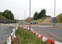 The roundabout at Hardengreen on Sunday 25 August. Looking north along the A7, with preparations for the new rail bridge continuing.<br><br>[John Furnevel 25/08/2013]