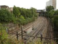 View south along the Crewe low level avoiding lines from the former Crewe North shed site in August 2013, with Manchester lines to the left and WCML lines on the right.<br><br>[David Pesterfield 30/08/2013]