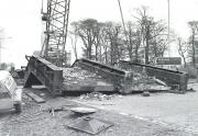 The steel bridge that carried the Edinburgh - Dundee main line over the Fordell Railway near Dalgety Baystanding on the adjacent A92 road following removal in November 1984 [see image 44453].<br><br>[Bill Roberton 11/11/1984]