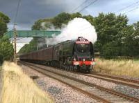 The returning 75th Anniversary special from Perth toSheffield on 7 September, with 46233 <I>Duchess of Sutherland</I> at speed on the Brock straight. A nice touch was provided by the burnished buffers displaying the letters LMS. The Duchess hauled the tour south as far as Crewe.<br><br>[John McIntyre 07/09/2013]