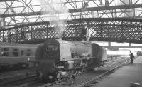 Relief engine awaiting the arrival of the 9.25am Crewe - Perth at Carlisle on 26 March 1964 is 46257 <I>City of Salford</I>.<br><br>[K A Gray 26/03/1964]