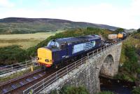 A southbound nuclear flask special crossing the bridge over the Loth Burn around five miles north of Brora on 17 September. DRS liveried 37611 leads with 37603 on rear.<br><br>[John Gray 17/09/2013]
