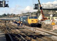 The PW team seems to be looking on a little pensively (as do one or two of the passengers) as 50003 <I>Temeraire</I> slowly rumbles over new track and pointwork into Exter St Davids station in 1986 with a Paddington bound train.<br><br>[Ian Dinmore //1986]