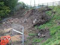The east side of Winston Road, Galashiels, on 18 September 2013, with more of the east portal of the filled in bridge now exposed [see image 44645].<br><br>[John Furnevel 18/09/2013]