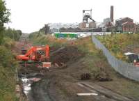 Work being carried out on the trackbed near the former Lady Victoria Colliery on 27 September 2013. The site of the planned Newtongrange station is in the left background.<br><br>[John Furnevel 27/09/2013]