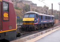 Scotrail-liveried sleeper locomotive 90024 and <I>Thunderbird</I> 67020 at the east end of Waverley on 24 September 2013.<br><br>[Bill Roberton 24/09/2013]