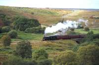 B1 61002 crossing the moors on 5 October with a train near Goathland.<br><br>[Peter Todd 05/10/2013]