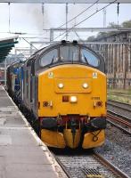 37688 and 37409 roar away from a signal stop at Carlisle on 11 October, taking an RHTT service from the Tyne Valley back to DRS Kingmoor.<br><br>[Bill Roberton 11/10/2013]