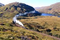 Black 5 No.44871 with the return working of <I>The Jacobite</I>makes a fine sight as it negotiates the long curve at the east end of Loch Eilt on a gloriously sunny afternoon on 11th October 2013. <br><br>[John Gray 11/10/2013]
