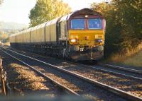 DBS 66183 hauls a rake of empty coal wagons north approaching Howsham on 9 October 2013 heading to Immingham.<br><br>[John McIntyre 09/10/2013]