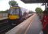 The chap on the right is very focussed. Perhaps he has just worked out that if you remove the digits 70 from 170.509, you get 15.09, which just happens to be the departure time of this train from platform 3 at Tamworth High Level to Nottingham. Or perhaps not...<br><br>[Ken Strachan 26/08/2013]