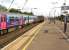 Looking south at Harlington, Bedfordshire, on 1 September as First Capital Connect Class 319smeet on services between St Pancras and Bedford. Platforms 1 & 2 are on the slow lines, normally used by FCC services, whilst over on platforms 3 & 4 the non stop EMT services rush pass.<br><br>[John McIntyre 01/09/2013]