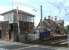 The station building and signal box at Chathill on 30 August 2013 seen looking north from the level crossing.<br><br>[Colin Alexander 30/08/2013]