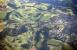 Aerial view over the triangle formed by Smyllum East, West and South junctions on the outskirts of Lanark, in 1999. The view is south, with Lanark Loch on the left and part of the town itself to the right. <br><br>[Ewan Crawford //1999]