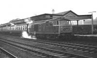 Late on a gloomy January afternoon in 1970, Hymek D7031 awaits its departure time at Cardiff General with the 16.35 to Portsmouth Harbour.  