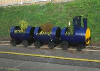 ScotRail's latest barrel-train at Musselburgh Station has been adopted by Musselburgh Rotary to mark the 25th anniversary of the station's opening on 1 October 1988.<br><br>[John Yellowlees 24/10/2013]