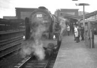 The RCTS <I>Rebuilt Scot Commemorative Railtour</I> waits to leave Carlisle platform 4 for Crewe on 13 February 1965. Locomotive in charge is 46115 <I>Scots Guardsman</I>. [See image 27040]<br><br>[K A Gray 13/02/1965]