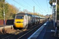 The 09.37 from Doncaster to Aberdeen, diverted off the ECML because of engineering work, passes through Kingsknowe on Sunday 10 November.<br><br>[Bill Roberton 10/11/2013]