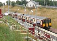 318261 calls at Merryton on 18 August 2006 with a Dalmuir - Larkhall service. <br><br>[John Furnevel 18/08/2006]