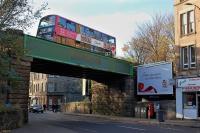 The rebuilt rail bridge over Dalry Road near the former Dalry Middle Junction. View west on 16 November 2013 with a no 22 bus crossing. [See image 29911]<br><br>[Bill Roberton 16/11/2013]